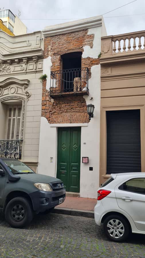 Buenos Aires: San Telmo, History, Bars, and Tango! - San Telmo Market by Gustave Eiffel: snack, souvenirs, and context
