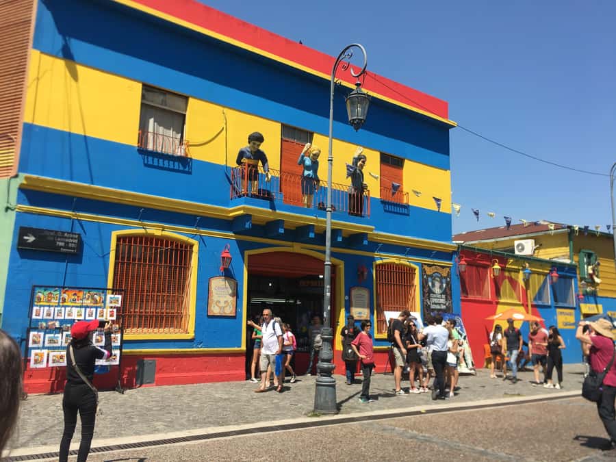 Buenos Aires:Small Group Tour AM & Sunset Open Bar Cruise PM - La Boca and Caminito: Color, Conventillos, and a Short Walk Through Story